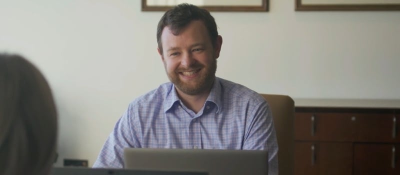 nathan talking with client